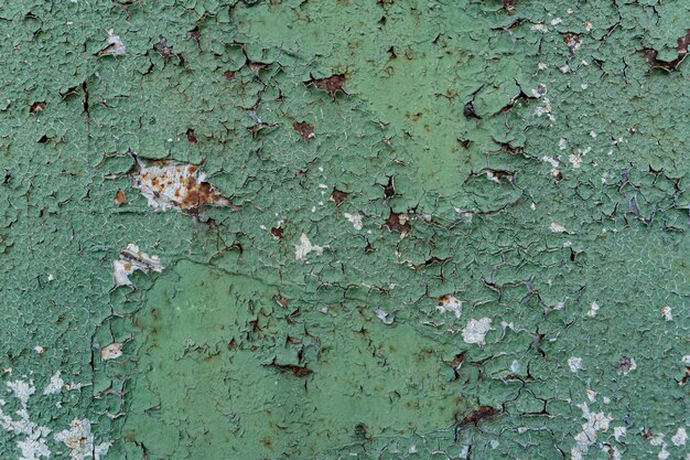 Distressed overlay texture of rusted peeled metal. Grunge background.