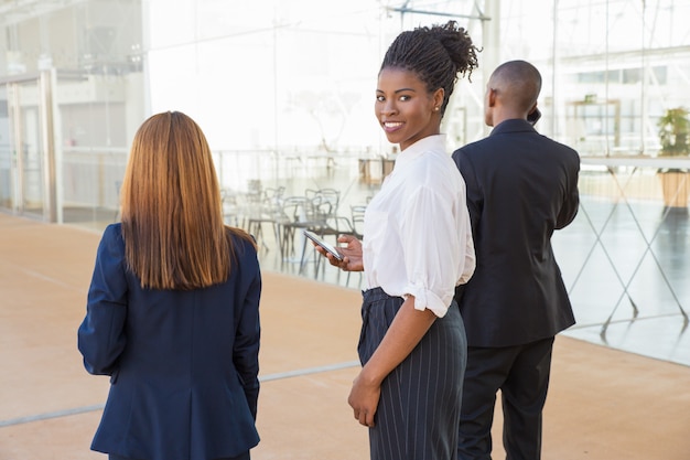 Diverse business colleagues on their way to office