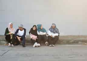 Free photo diverse children studying outdoor