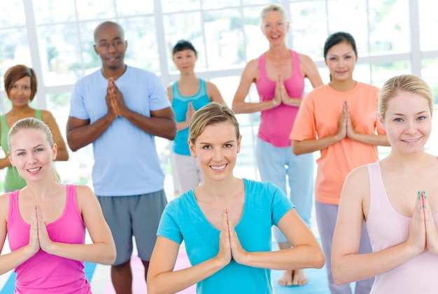 Diverse group of adults exercising