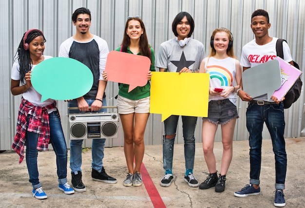 Diverse Group People Holding Speech Bubble Concept