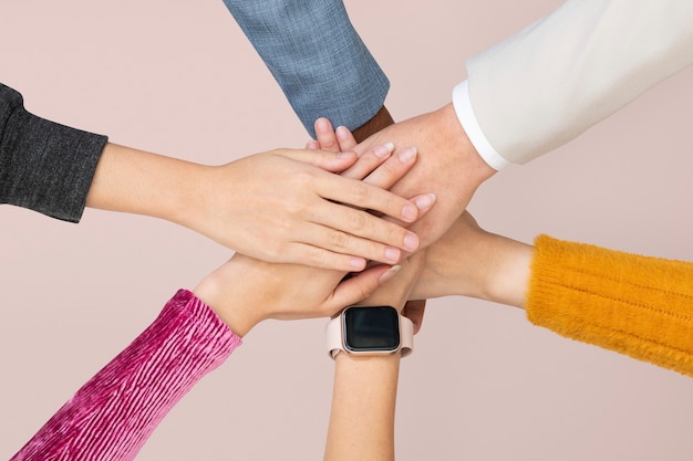 Diverse hands united in teamwork concept