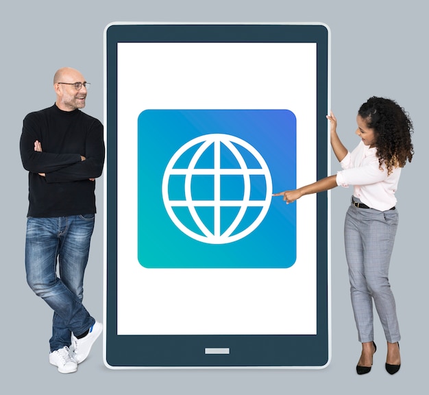 Free photo diverse  people standing beside a tablet with www icon