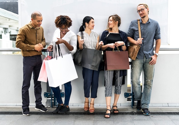 Free photo diverse people with shopping bags