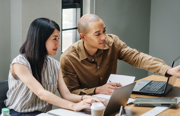 Free photo diverse people working at an office