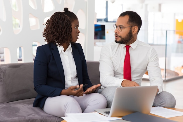 Diverse professionals discussing project