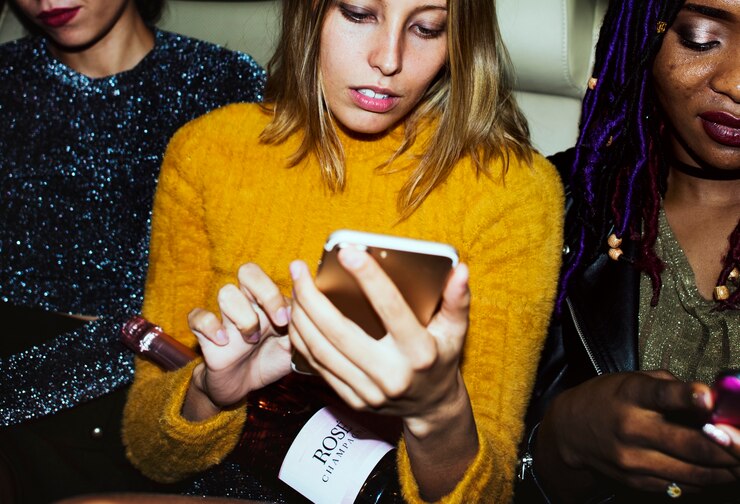 Free Photo diverse women in a backseat of a cab