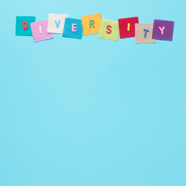 Free photo diversity word made of colorful cards with copy space