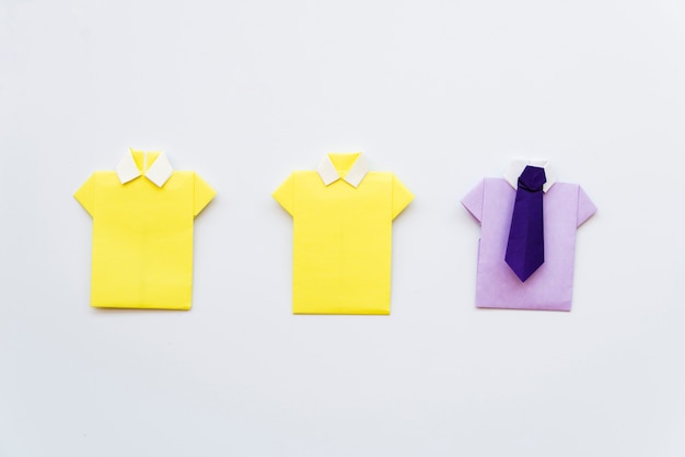 Diy yellow and purple shirt paper on white background