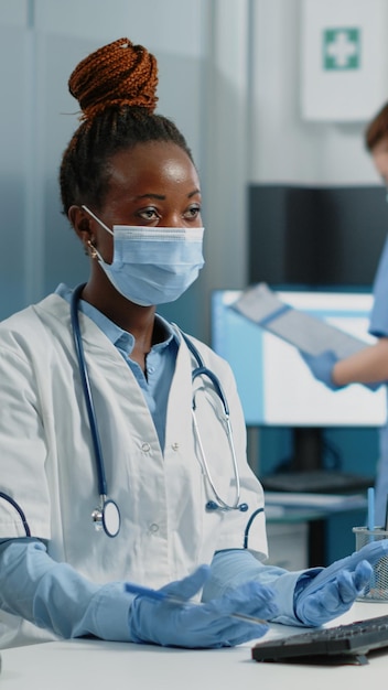 Doctor asking patient to sign consultation papers for prescription treatment. Woman doing signature on checkup document after medical examination for healthcare. Person signing files