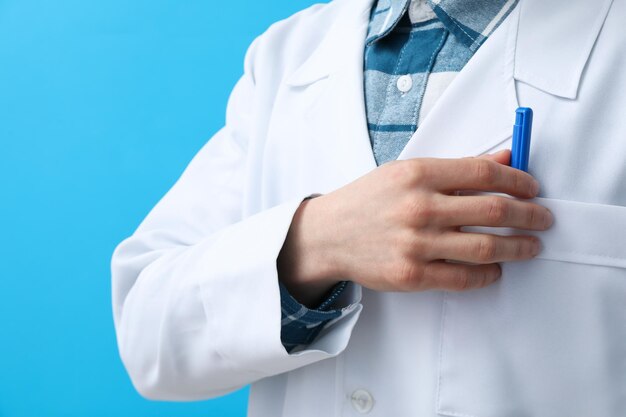 Doctor on blue background healthcare Medical Workers Day concept