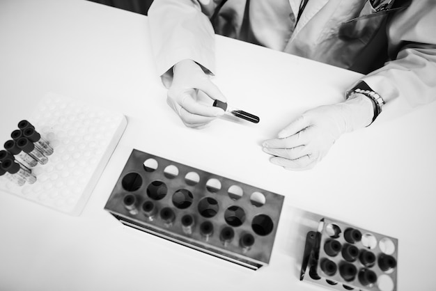 Free photo doctor checking blood samples