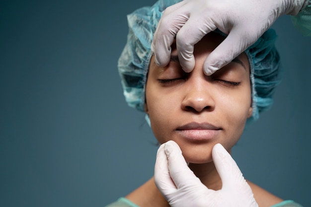 Doctor checking patient at hospital before surgery