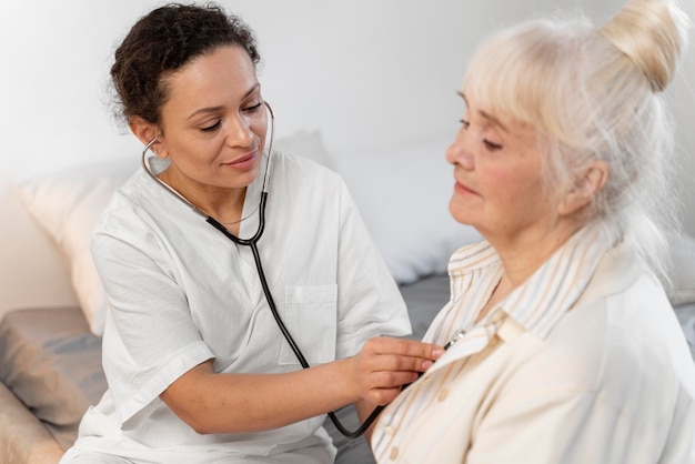 Doctor checking a patient's heart