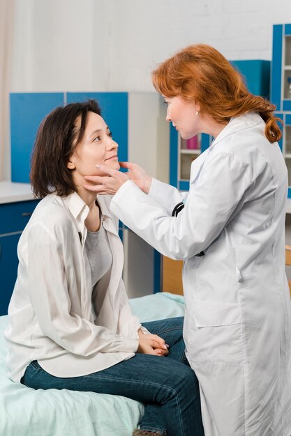 Doctor consulting patient with her hands