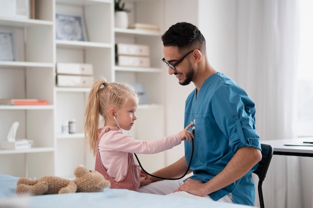 Doctor doing their work in pediatrics office