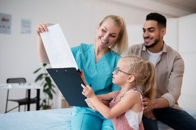 Doctor doing their work in pediatrics office