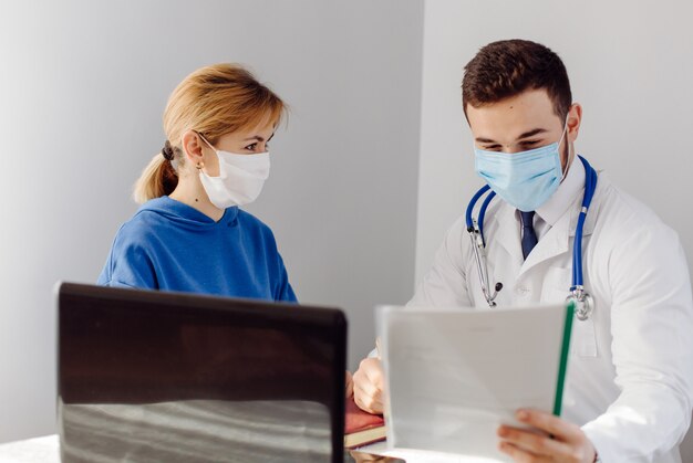 Doctor examines the patient . Medicine and health care concept.