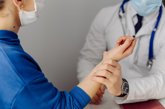 Doctor examines the patient . Medicine and health care concept.