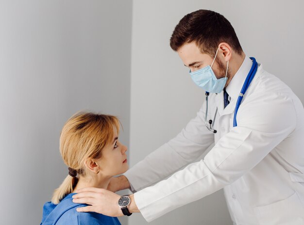 Doctor examines the patient . Medicine and health care concept.