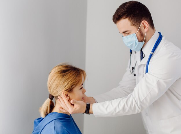 Doctor examines the patient . Medicine and health care concept.