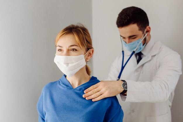 Doctor examines the patient . Medicine and health care concept.