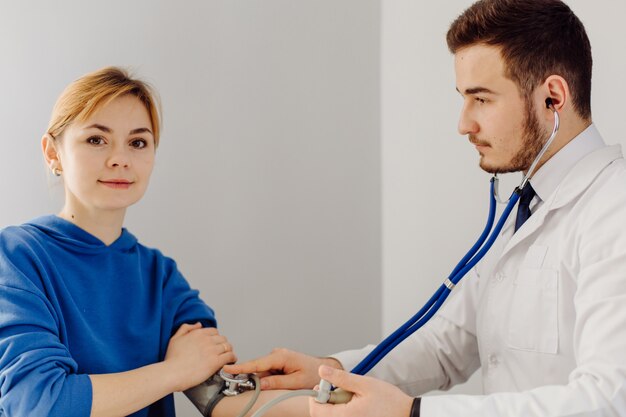 Doctor examines the patient . Medicine and health care concept.