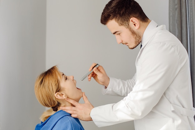 Doctor examines the patient . Medicine and health care concept.