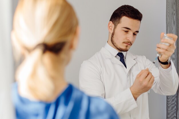 Doctor examines the patient . Medicine and health care concept.