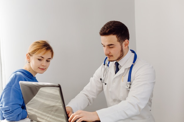 Doctor examines the patient . Medicine and health care concept.