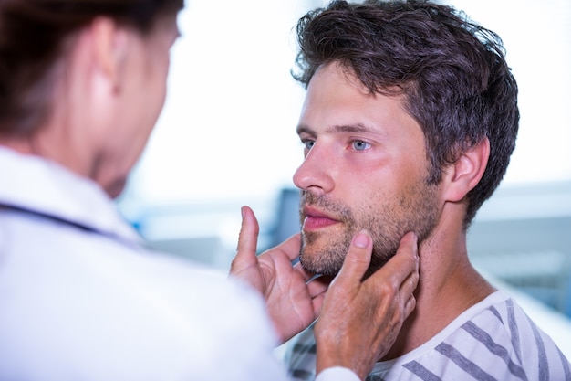 Doctor examining a patient