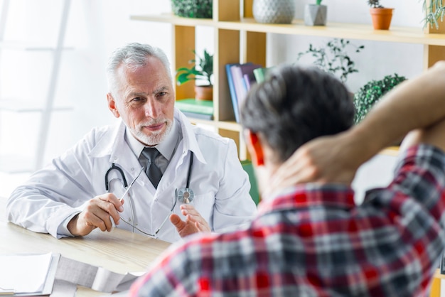 Doctor explaining treatment to patient