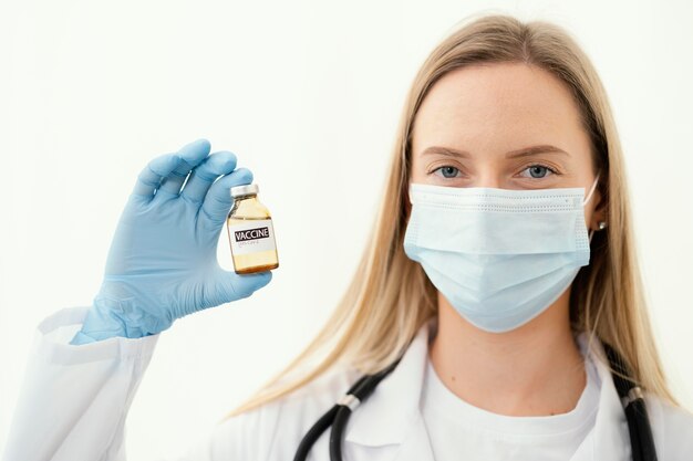 Doctor getting ready a vaccine for a patient