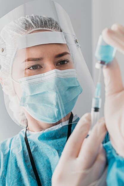 doctor getting ready a vaccine