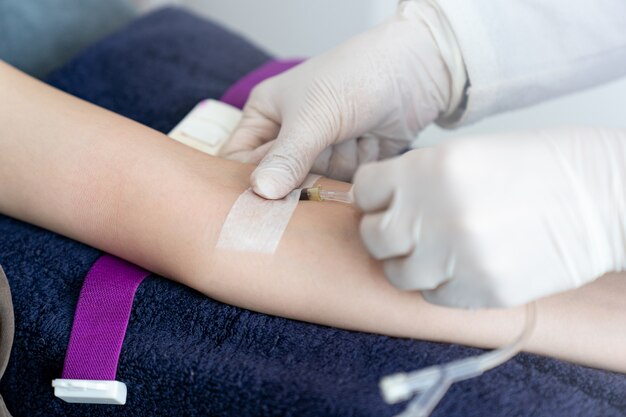 Premium Photo Doctor Hand Put Intravenousiv Injection On Patient