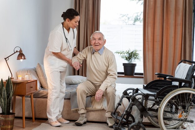 Doctor helping senior patient