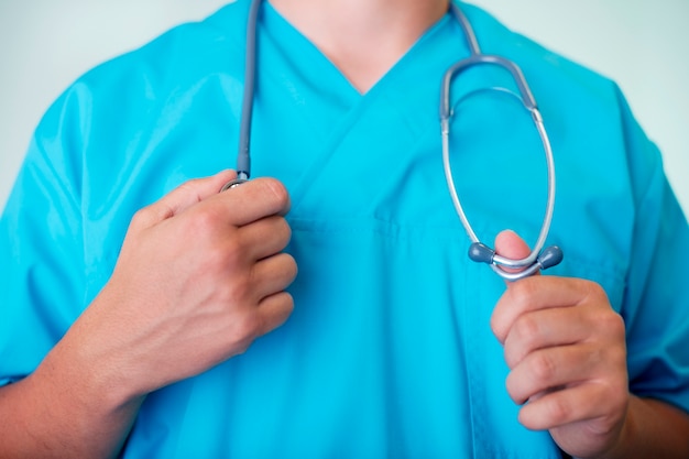 Doctor holding stethoscope