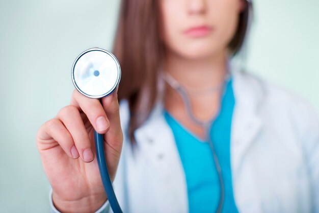 Doctor holding stethoscope