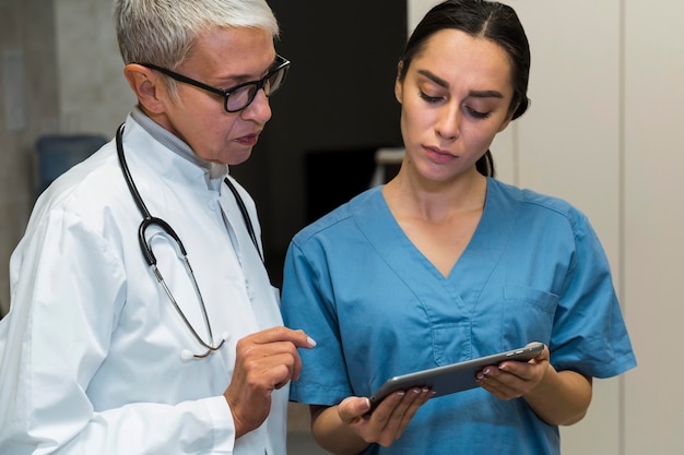 Doctor and nurse talking