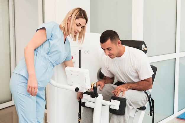 Doctor and patient checking medical device