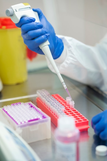 Doctor performing medical research in lab