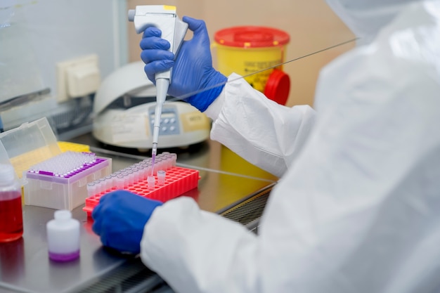 Free photo doctor performing medical research in lab