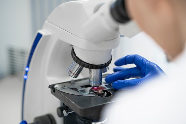 Free photo doctor performing medical research in lab