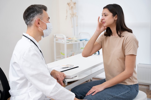 doctor performing routine medical checkup