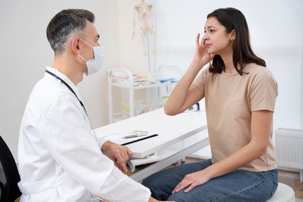 Doctor performing routine medical checkup