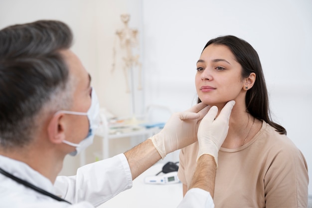 Doctor performing routine medical checkup