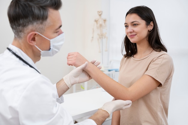 Doctor performing routine medical checkup