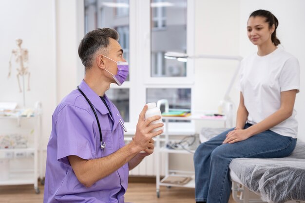 Doctor performing routine medical checkup