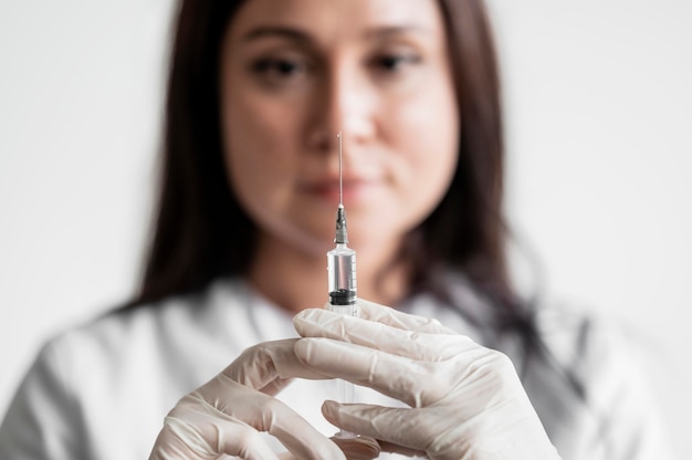 Doctor preparing medical vaccine