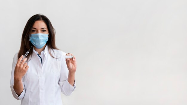 Doctor preparing medical vaccine